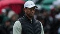 Tiger Woods walks on the 18th hole during the weather delayed second round of the Masters golf tournament at Augusta National Golf Club on Saturday, April 8, 2023, in Augusta, Ga.