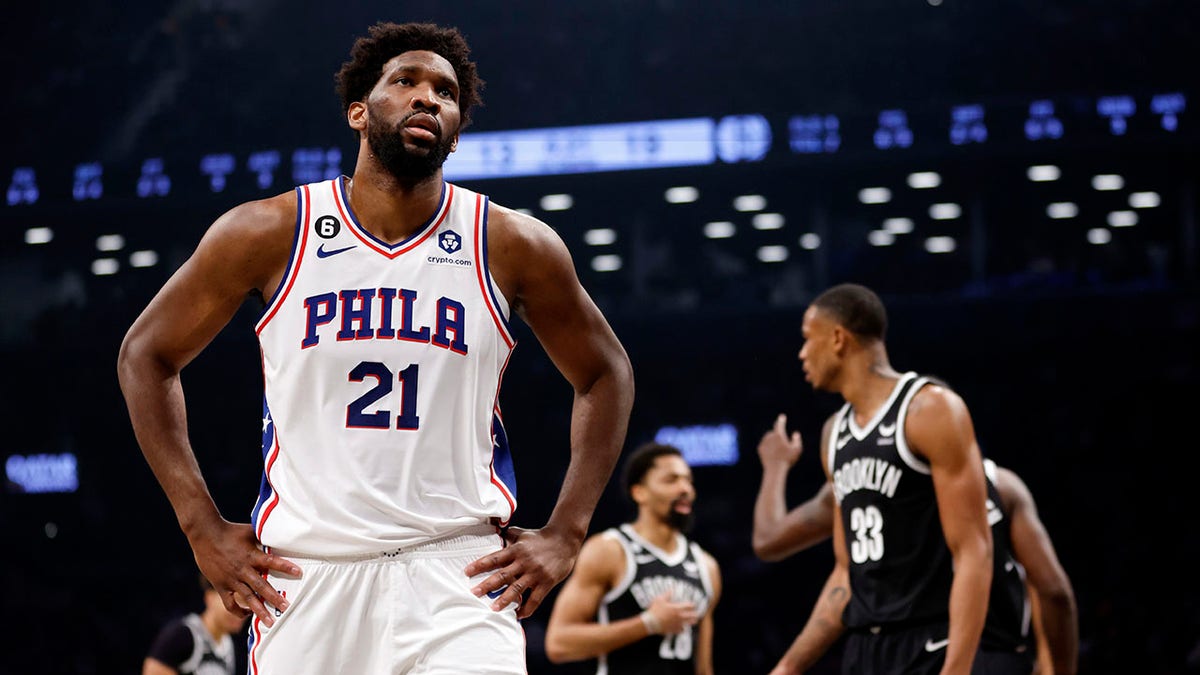 Joel Embiid reacts during a playoff game