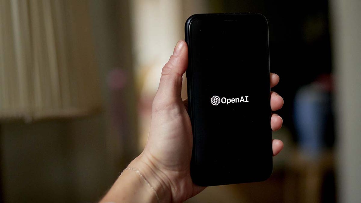 The OpenAI logo on a smartphone