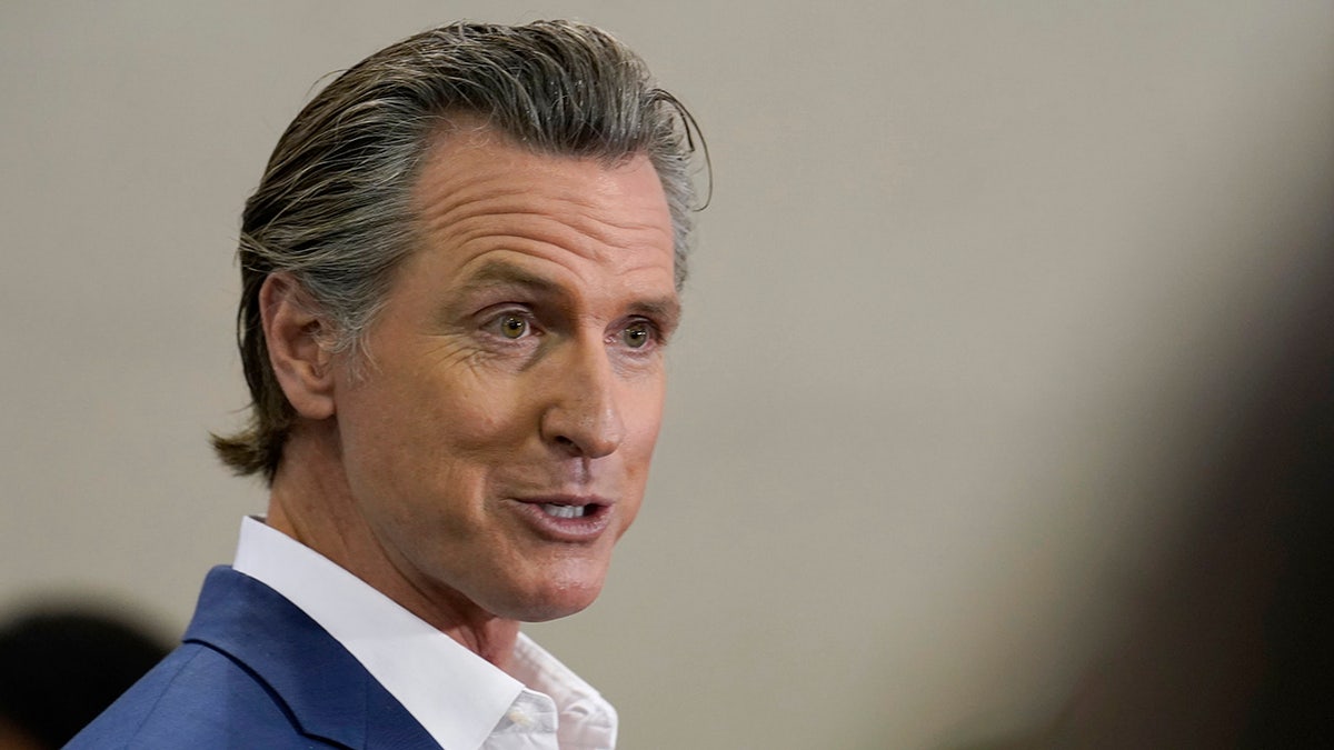 Newsom smirks