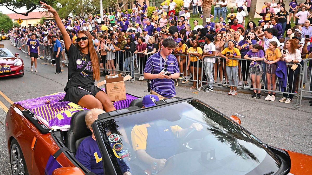 Angel Reese celebrates the national championship