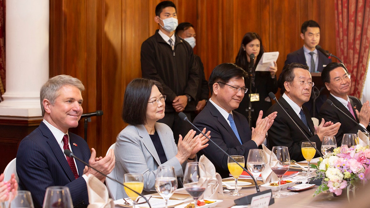 U.S. and Taiwanese leaders sitting