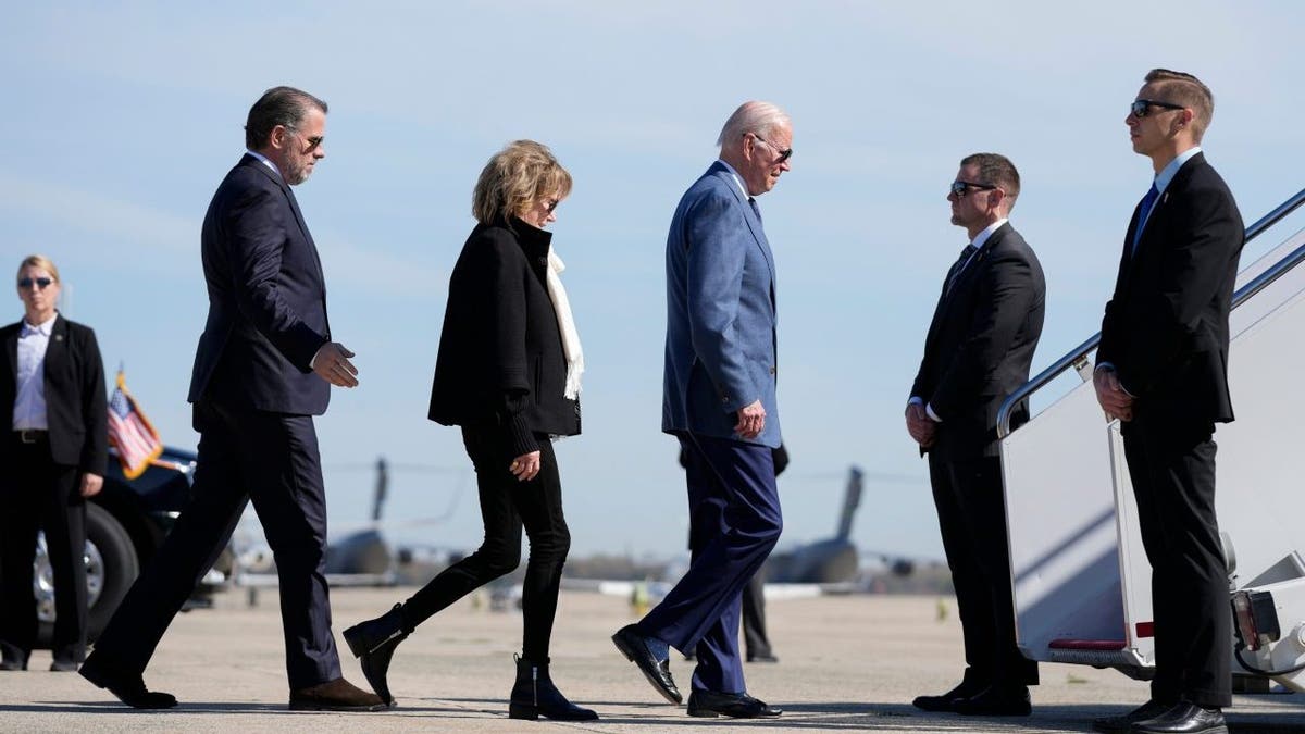 Joe Biden walks to board Air Force One, Tuesday, April 11, 2023