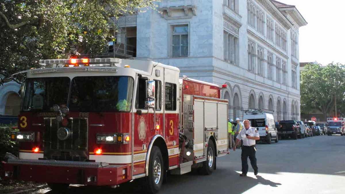 A firetruck sits outside the historic federal courthouse in Savannah