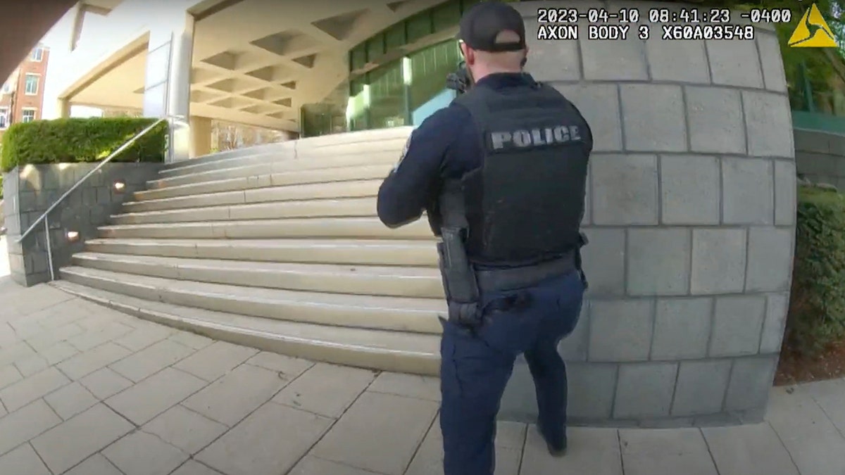 A police officer outside of the bank