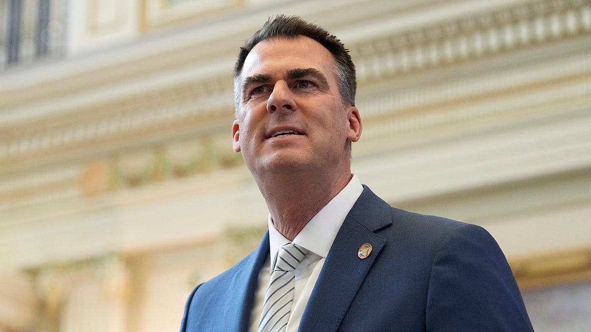 Kevin Stitt smiles