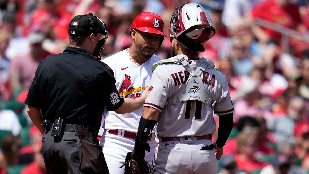 Willson Contreras speaks to the Arizona catcher