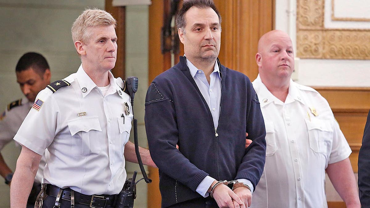 Brian Walshe, accused of killing wife Anna, who disappeared on New Year's Day 2023, enters a courtroom for his arraignment April 27, 2023, in Dedham, Mass.