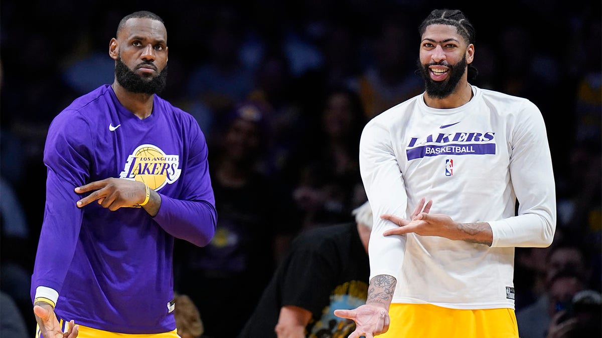 LeBron James and Anthony Davis celebrate