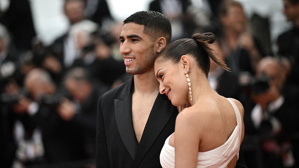 Achraf Hakimi and wife on red carpet