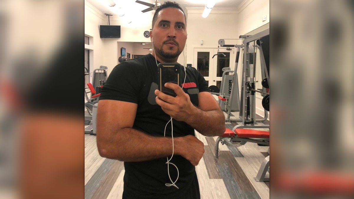 Antonio Cordero Rios poses in the gym for a selfie