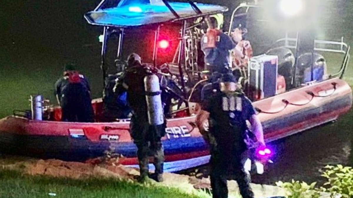 Police Harbor Division divers and a Fireboat