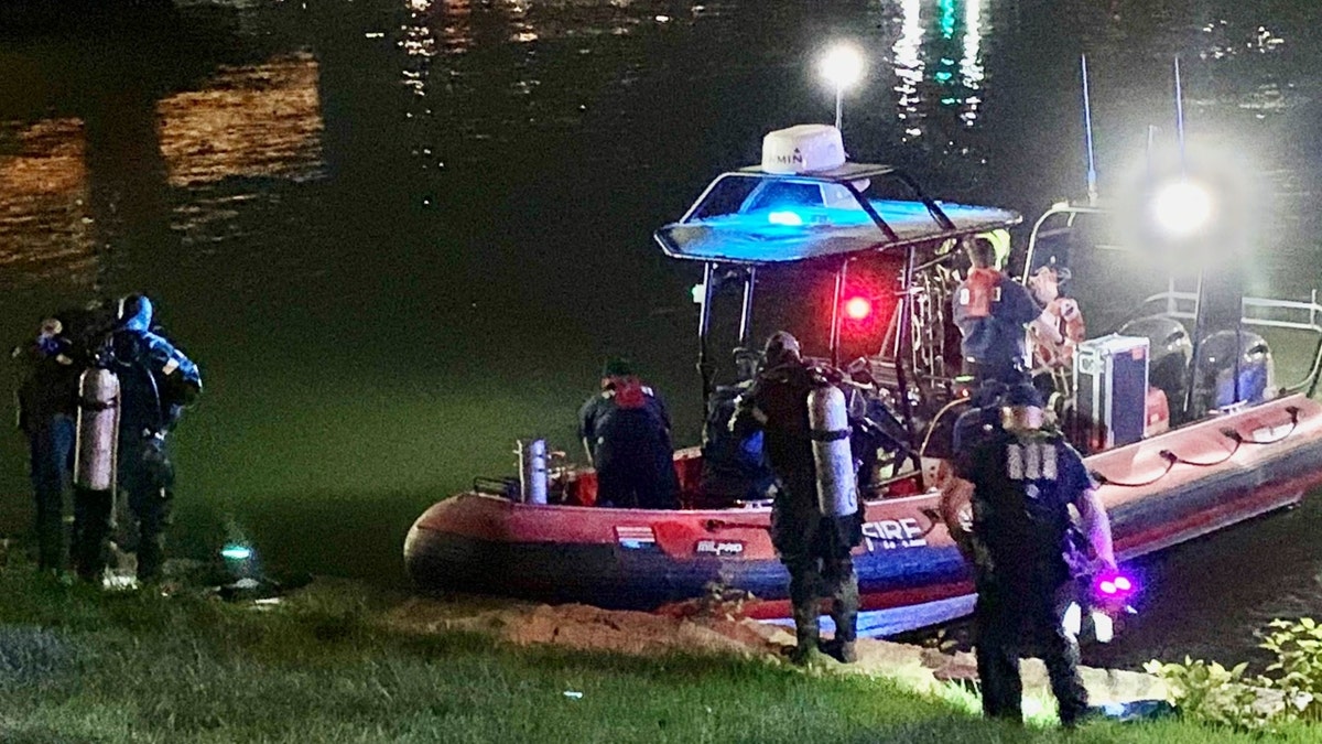 Police divers and a Fireboat