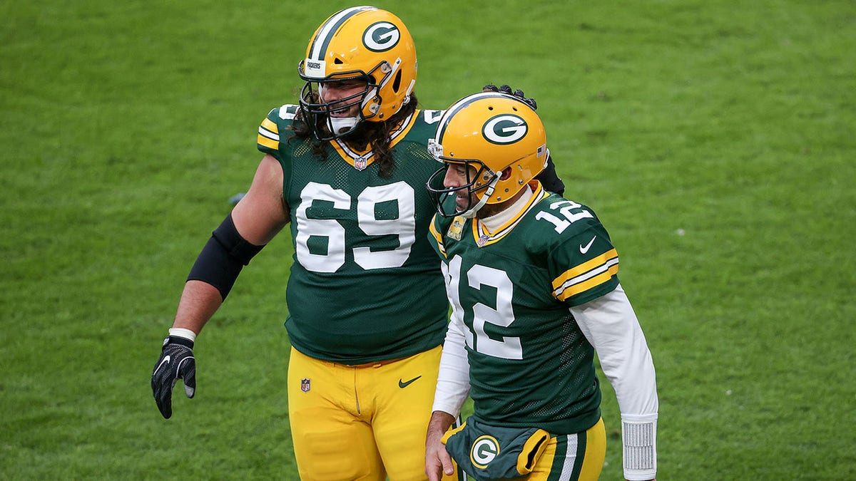 Aaron Rodgers and David Bakhtiari celebrate