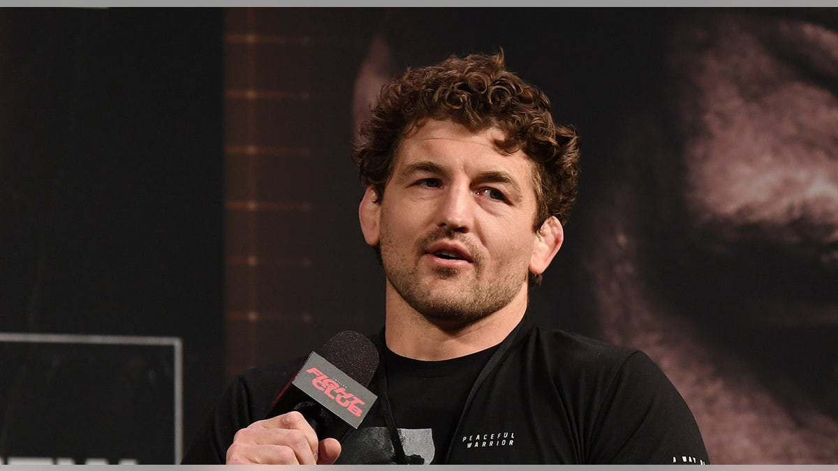Ben Askle speaks on the microphone