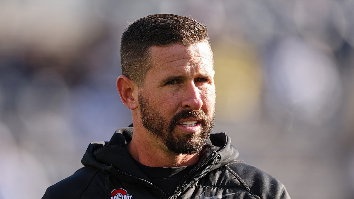 Passing game coordinator Brian Hartline of the Ohio State Buckeyes looks on before the game against the Penn State Nittany Lions at Beaver Stadium on October 29, 2022 in State College, Pennsylvania.