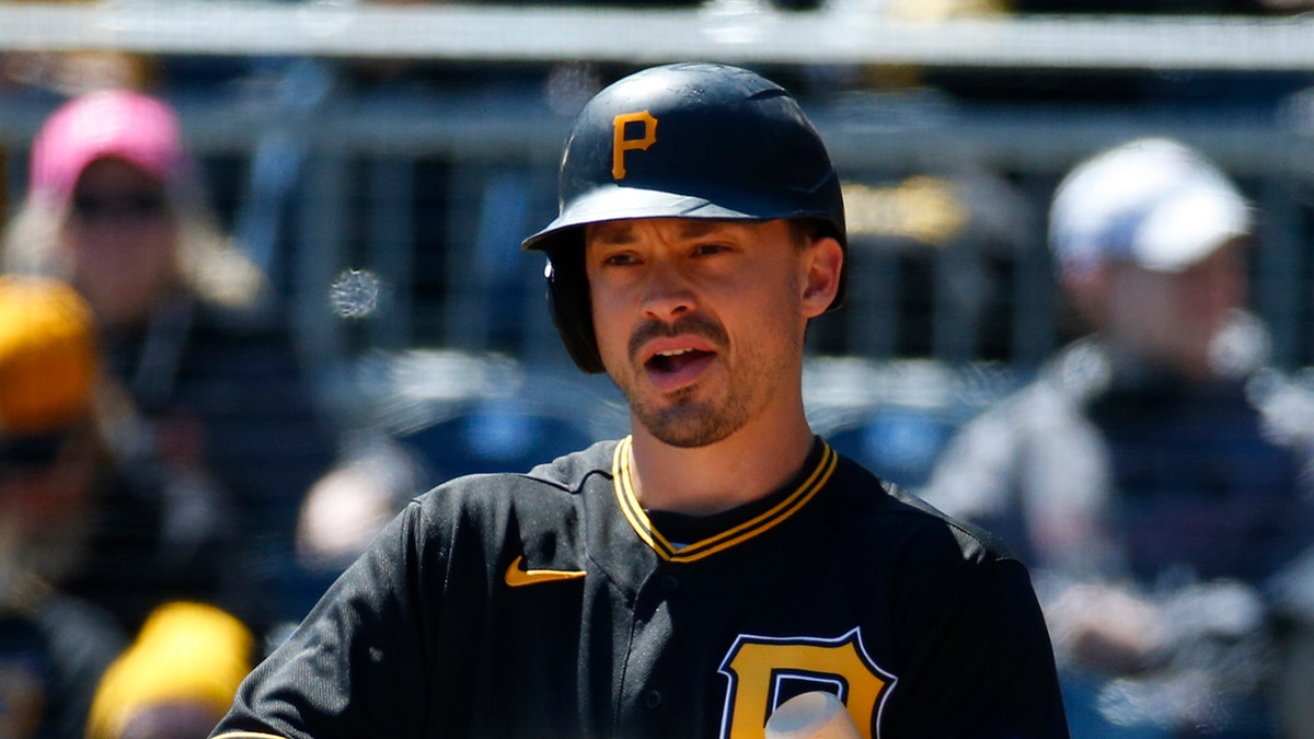 Bryan Reynolds looks down third base line