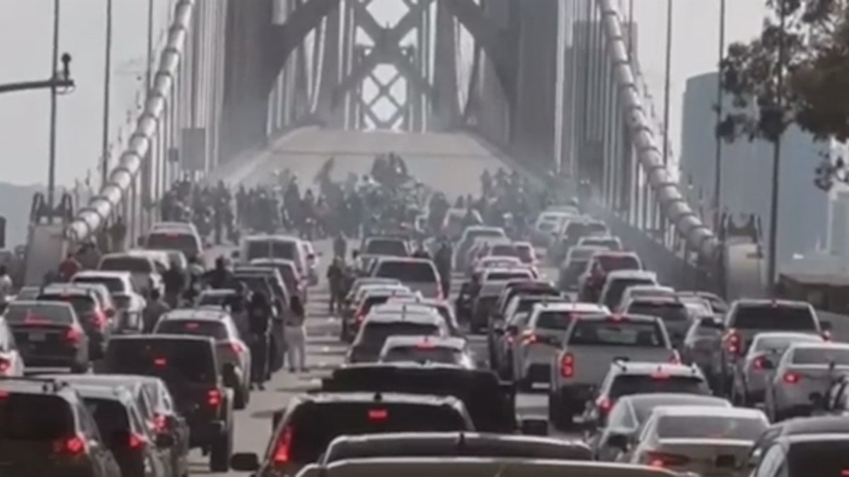 Video shows motorcyclists performing in a chaotic sideshow stopping traffic on the Bay Bridge