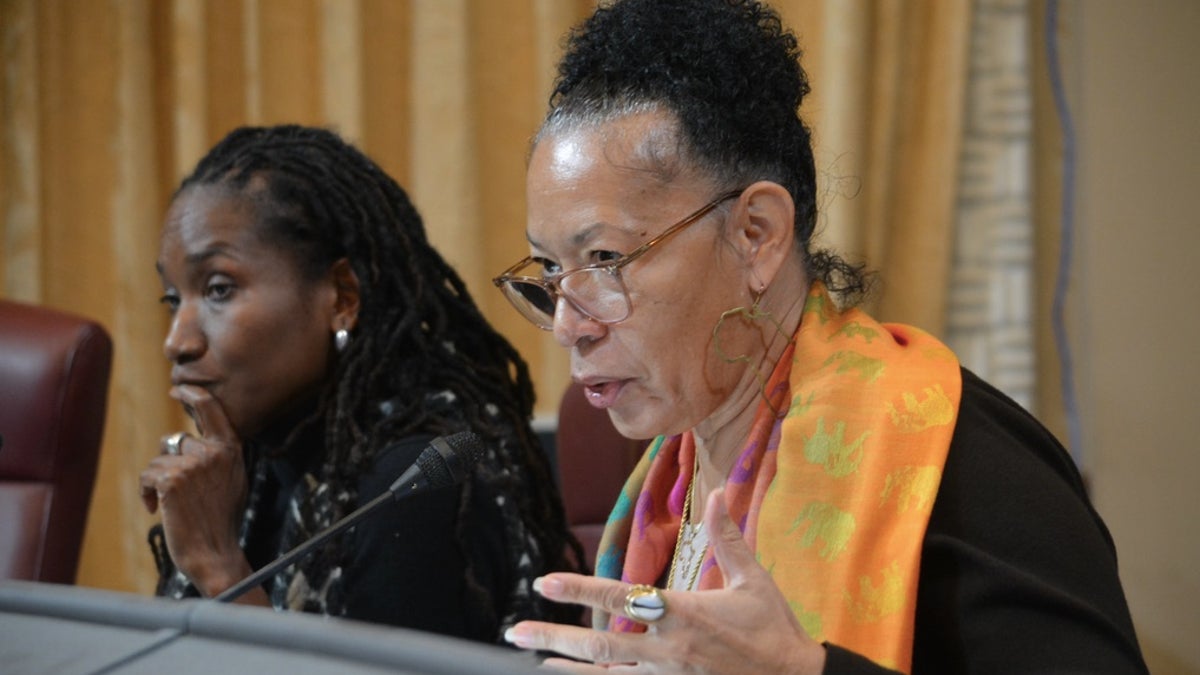 Cheryl Grills, right, and Lisa Holder, left, both members of the California Reparations Task Force