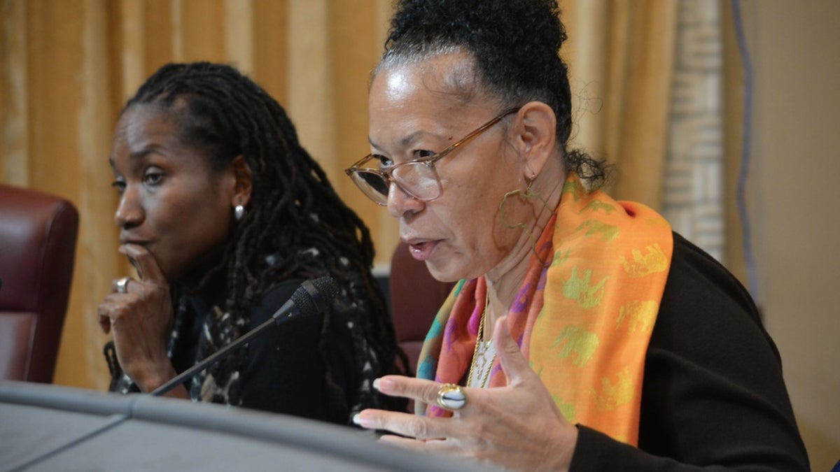 Cheryl Grills, right, and Lisa Holder, left, both members of the California Reparations Task Force