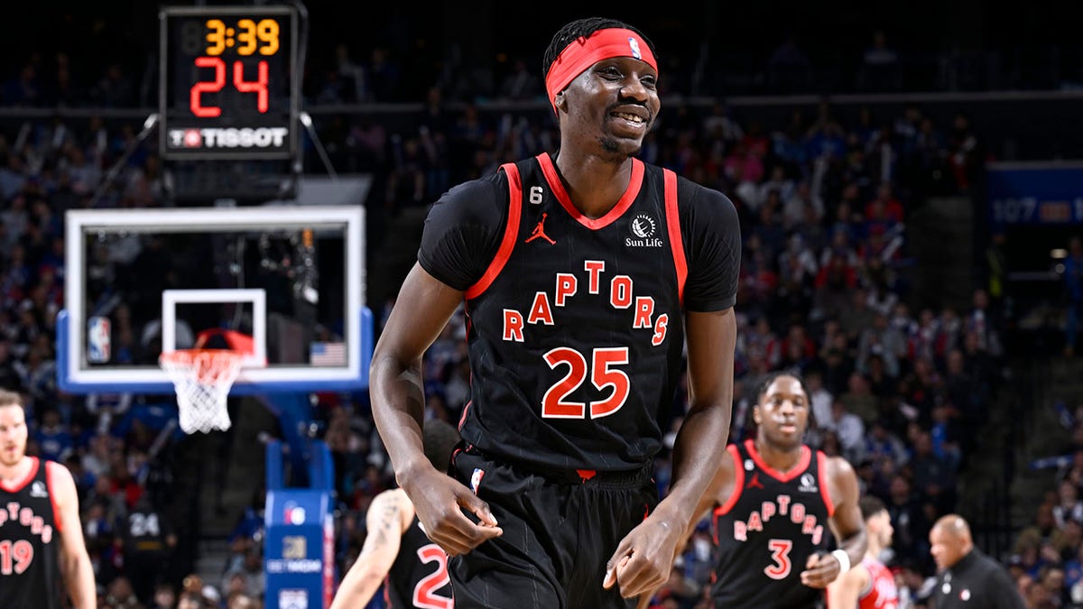 Chris Boucher looks on during a Raptors game