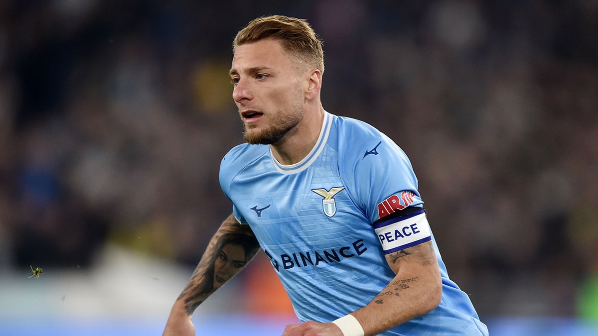 Ciro Immobile runs on field