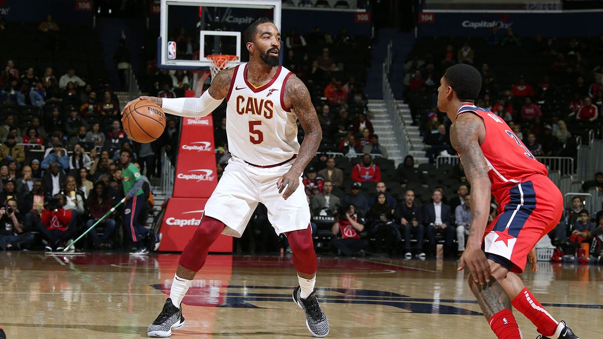 JR Smith handles the basketball during a game