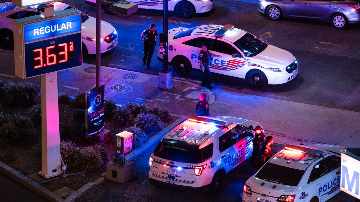 DC Metro police vehicles at gas station 