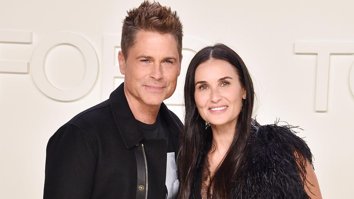 Rob Lowe and Demi Moore at the Tom Ford Fashion Show in 2020