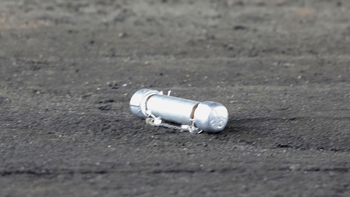 A suspicious object is seen on the ground