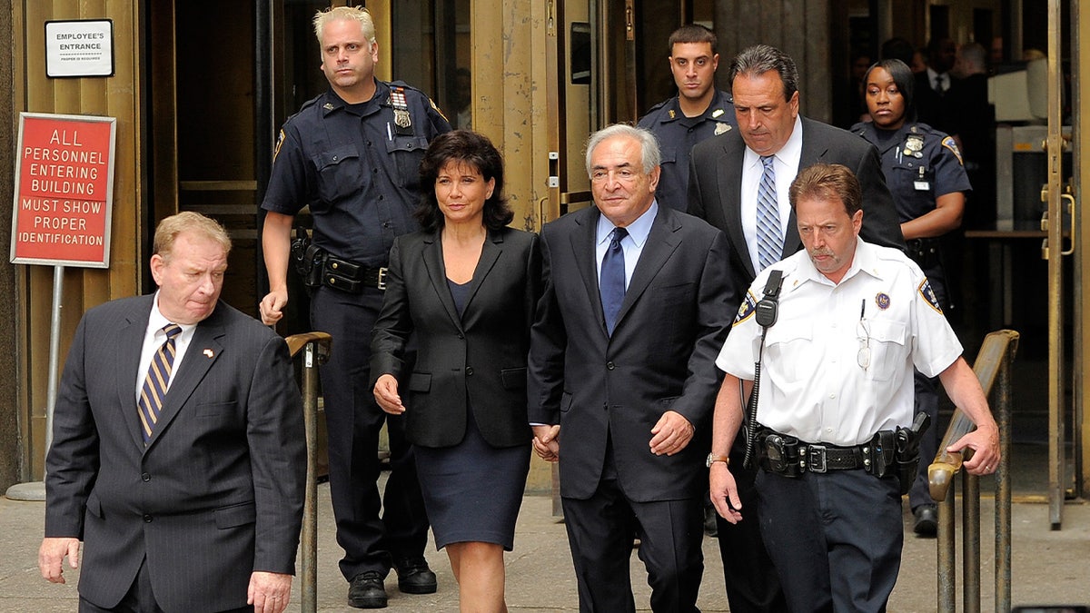 Dominque Strauss-Kahn and Anna Sinclair exit the Manhattan Criminal Courthouse.