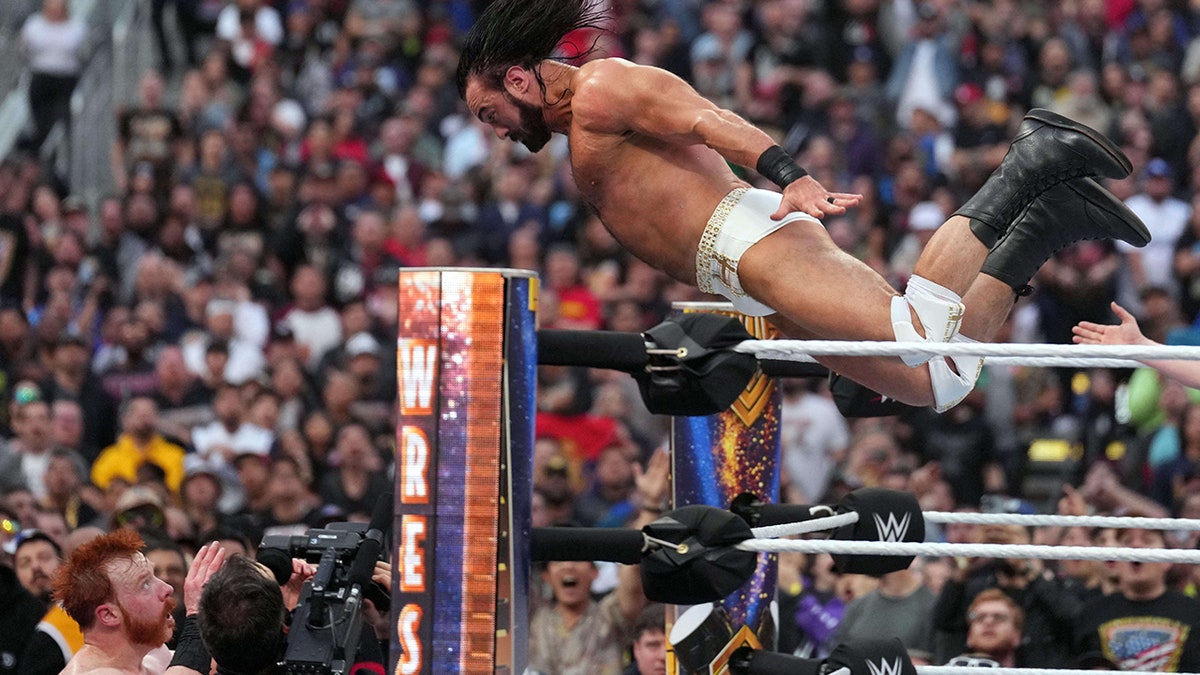 Drew McIntyre flies through the air