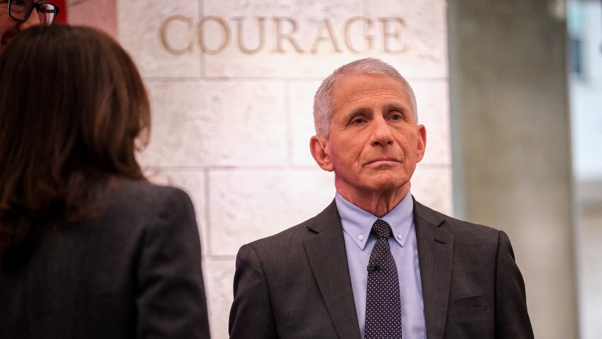 Dr. Anthony Fauci stands