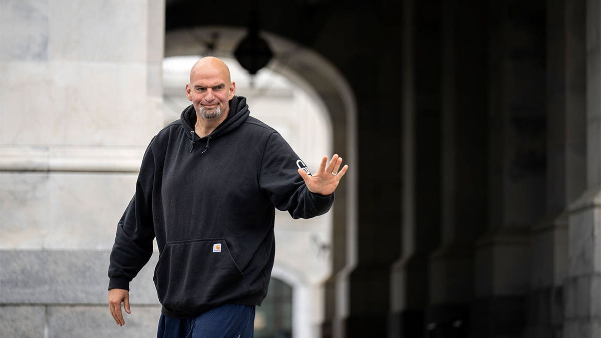 Fetterman waves to camera
