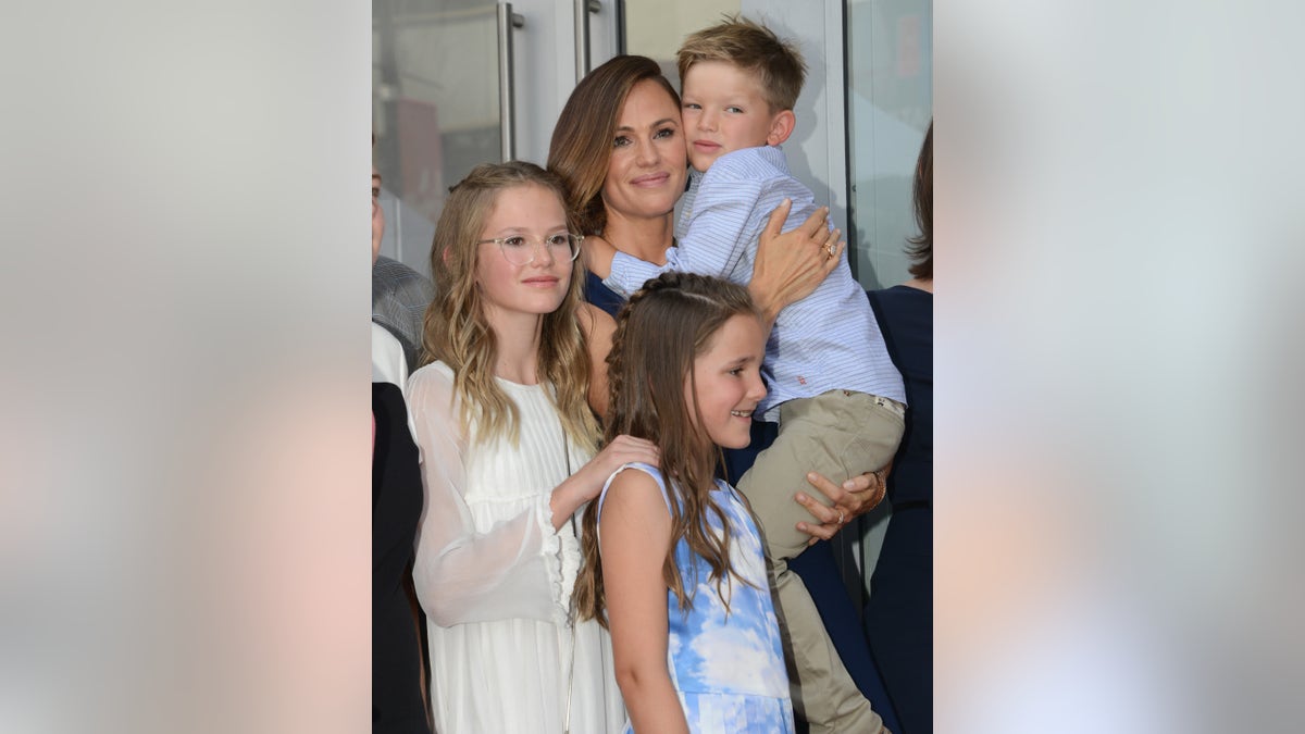 Jennifer Garner poses with her three kids in 2018