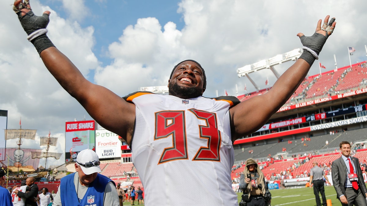 Gerald McCoy reacts after beating the Eagles