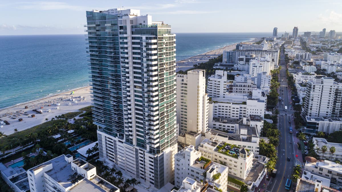 Florida, Miami Beach, aerial of The Setai Miami Beach hotel and Collins Avenue