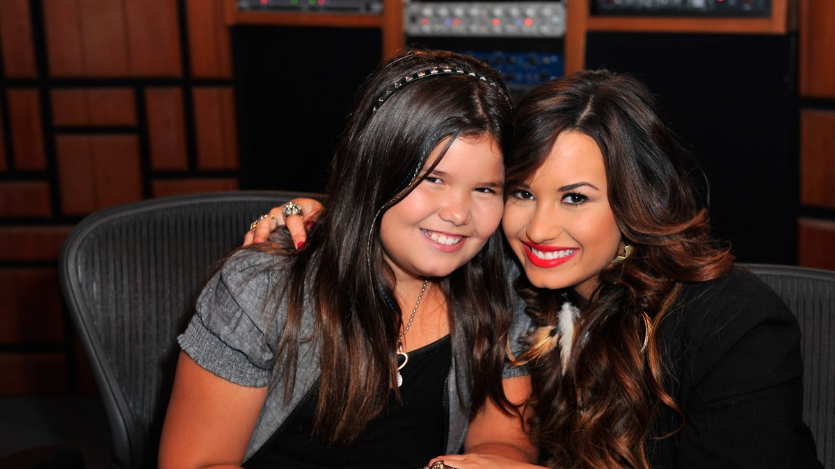 Demi Lovato with her sister Madison De La Garza