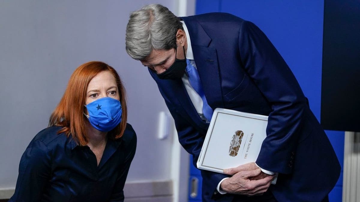 White House Press Secretary Jen Psaki confers with Special Presidential Envoy for Climate John Kerry