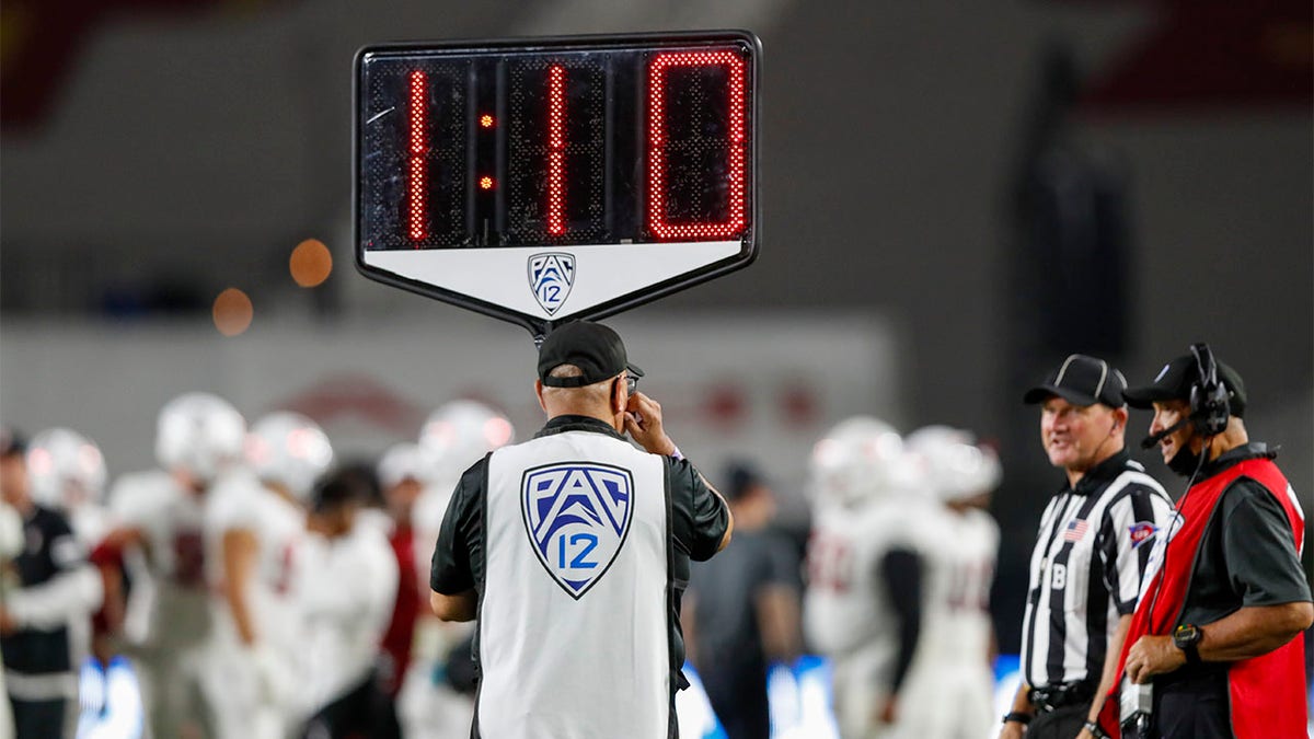 NCAA rules panel approves keeping clock running on college football first  downs