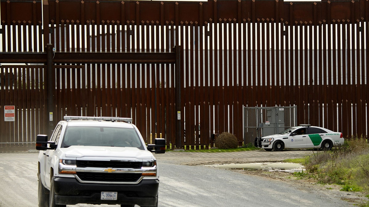 A photo of a vehicle in front of the border