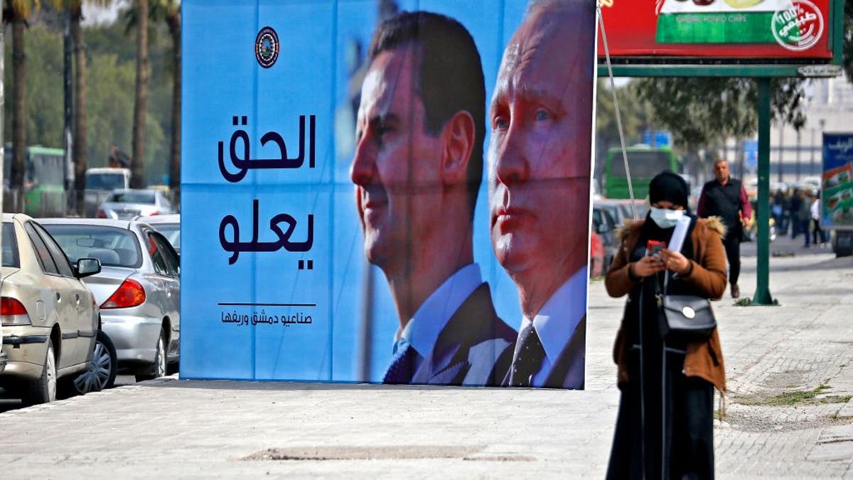 Billboard de Assad y Putin