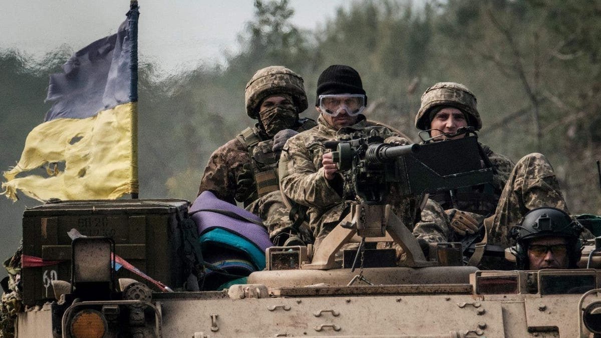Ukraine soldiers in armored vehicle