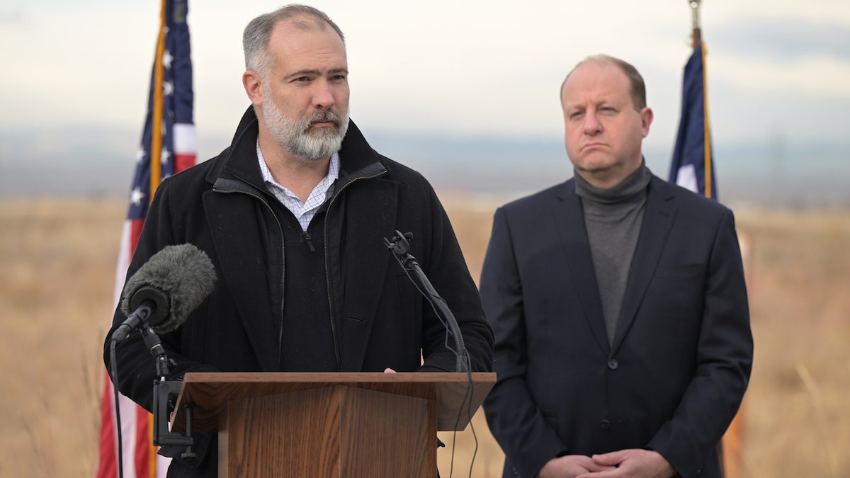 Deputy Secretary of the Interior Tommy Beaudreau speaks alongside Colorado Gov. Jared Polis in Commerce City, Colorado, on Dec. 14, 2022.