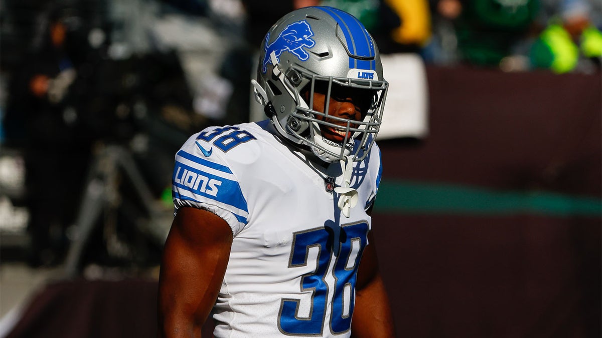 C.J. Moore warms up before a game against the Jets