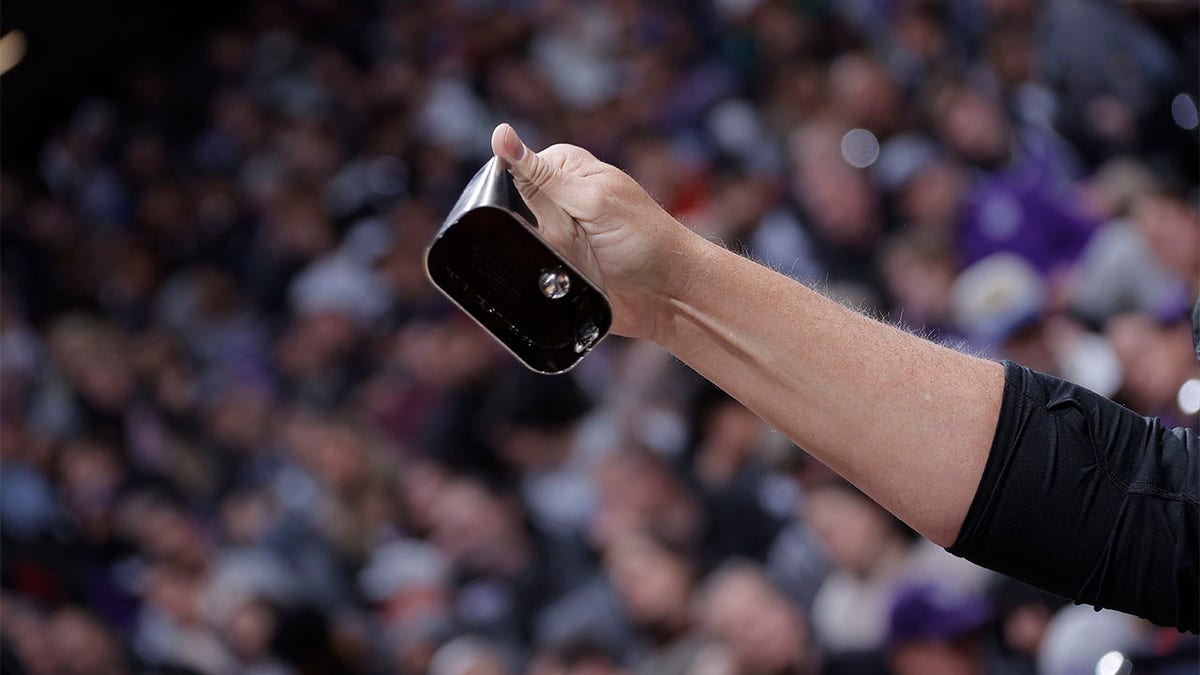 Sacramento Kings fan rings a cowbell