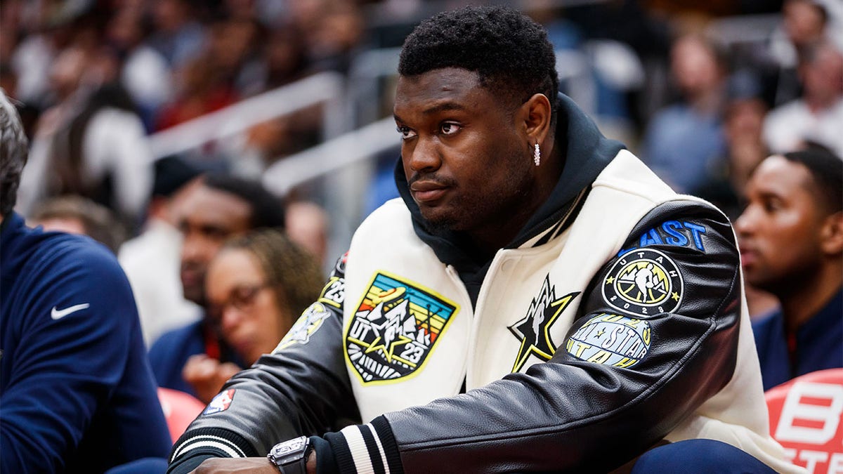 Zion Williamson sits on the bench