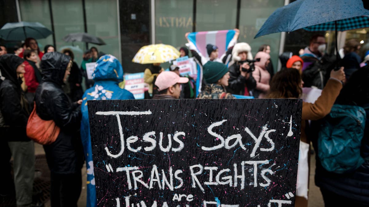 Jesus trans rights sign