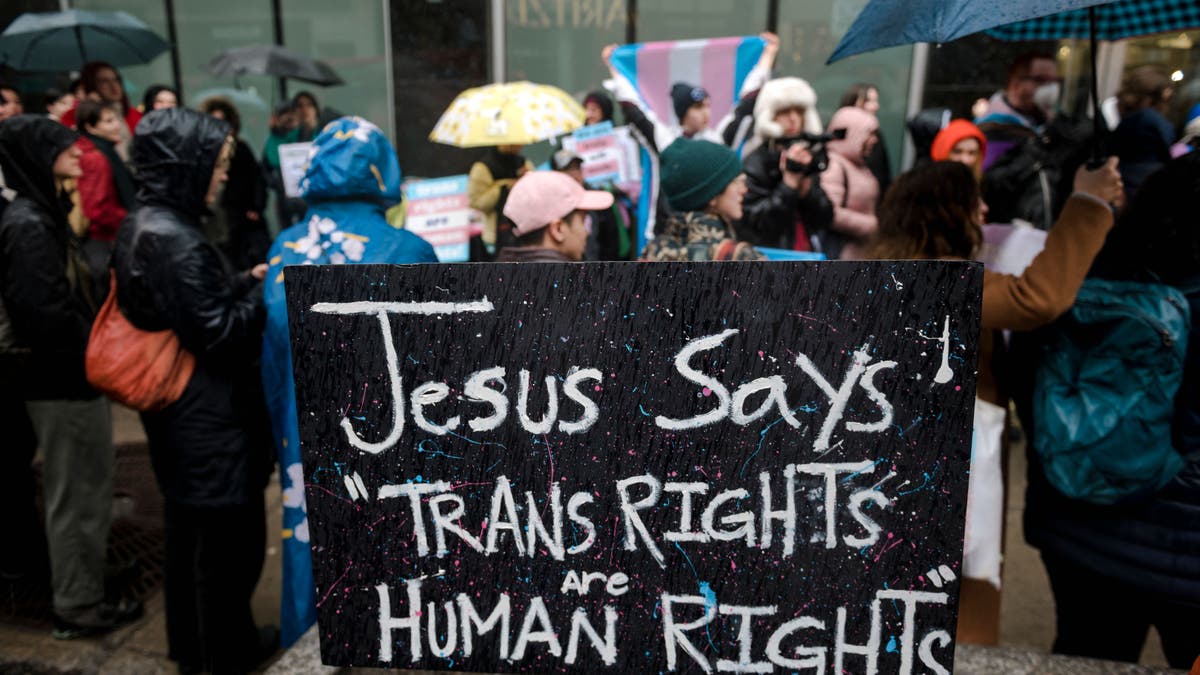 Jesus trans rights sign