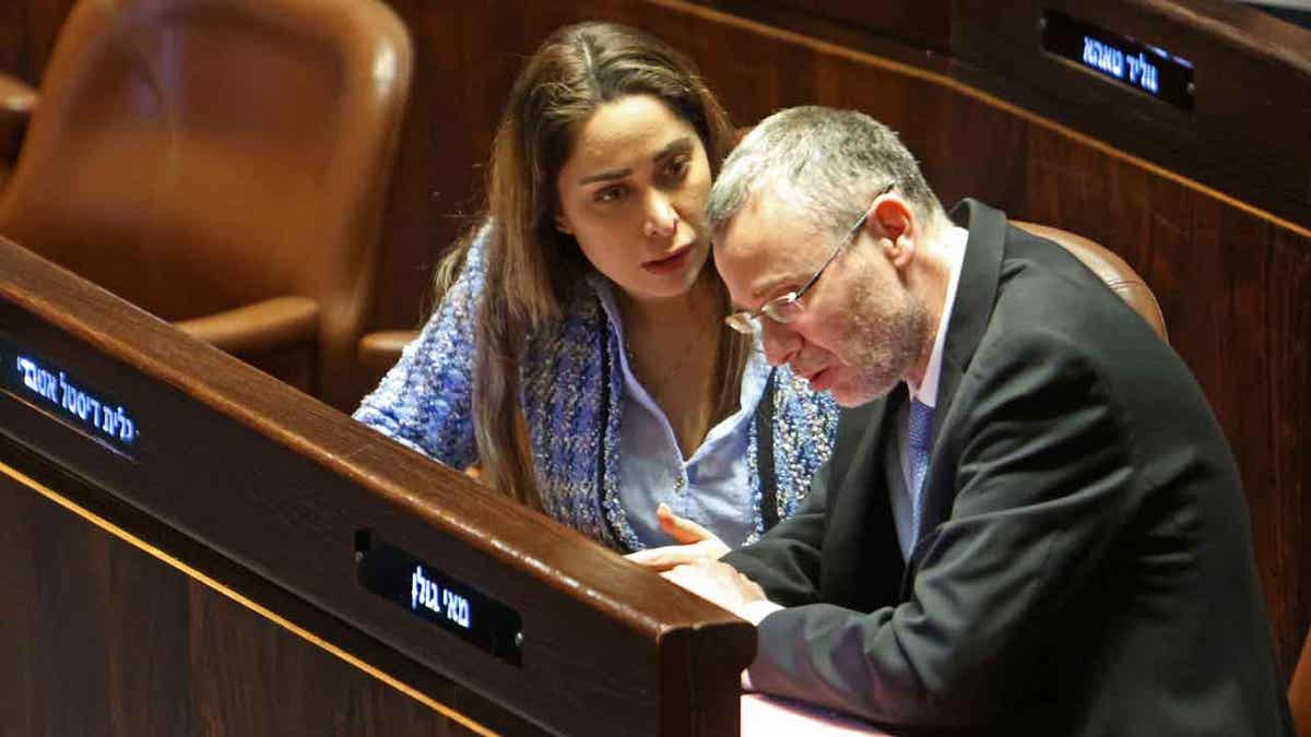 Israeli Justice Minister Yariv Levin and May Golan